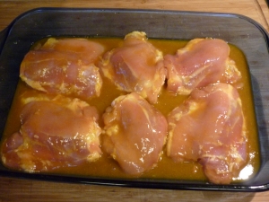 In a one-cup measure mix 1/2 cup honey, 1/4 cup prepared mustard (I use yellow), and 1 tsp. curry powder. Pour over chicken in a 9x13" greased baking dish.