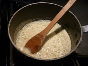Make a roux of 4 Tbsp. butter, 1/4 cup flour, 1/2 tsp. salt and 1/8 tsp. pepper